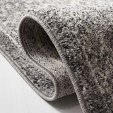 SAFAVIEH Evoke Collection Area Rug - 9' x 12', Ivory & Taupe, Oriental Distressed Design, Non-Shedding & Easy Care, Ideal for High Traffic Areas in Living Room, Bedroom (EVK256E)