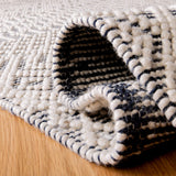 SAFAVIEH Area Rug 8x10 - Natura Collection - Large - Ivory, Handmade Wool, Moroccan Boho Fringe Design, Ideal for Living Room, Bedroom, Dining Space (NAT852B)