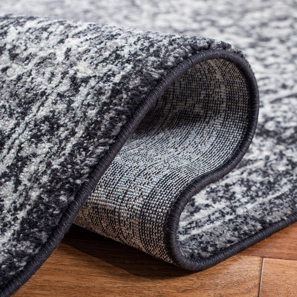 SAFAVIEH Evoke Collection Area Rug - 9' x 12', Ivory & Taupe, Oriental Distressed Design, Non-Shedding & Easy Care, Ideal for High Traffic Areas in Living Room, Bedroom (EVK256E)